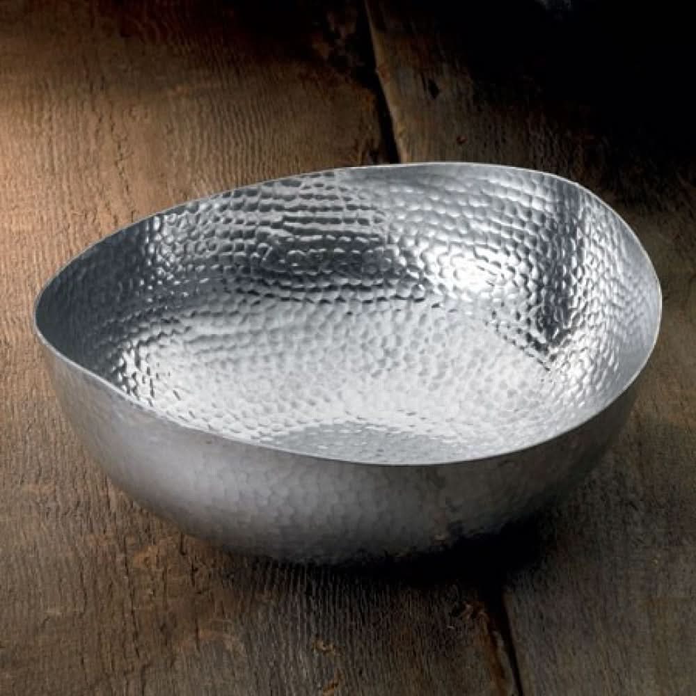 Handcrafted 12" hammered stainless steel centerpiece bowl on a rustic wooden surface.