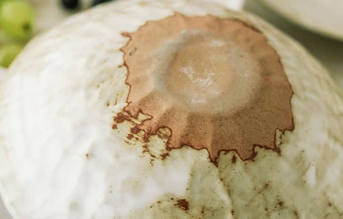 Handcrafted Japanese Love Ceramic Dinner Plate, textured off-white with rustic brown glaze.