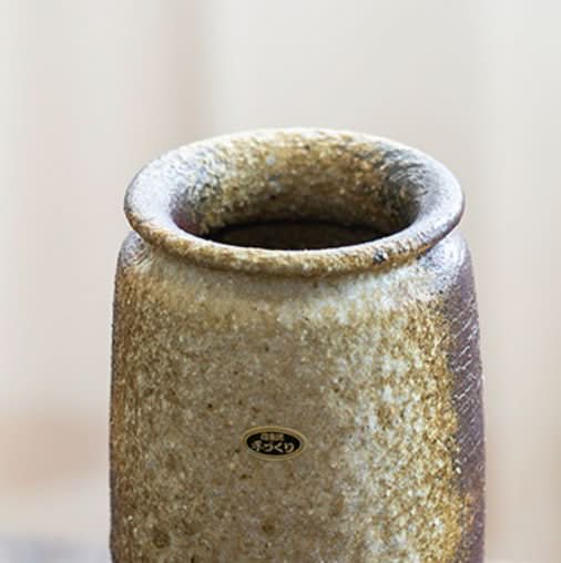 Handmade Japanese kiln glazed vase, earthy tones, textured ceramic. Perfect for Zen flower arrangements.