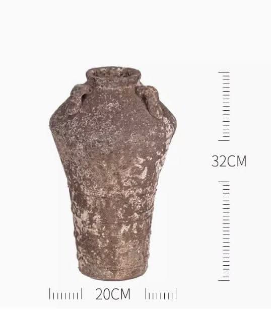 Handmade rough pottery vase, brown and textured, ideal for succulents or dried flowers. Home decor.