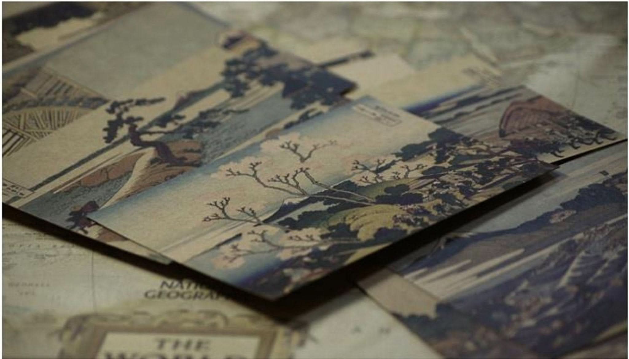 Hokusai Japanese Art Postcards: Ukiyo-E landscapes in blue, green, brown on paper.