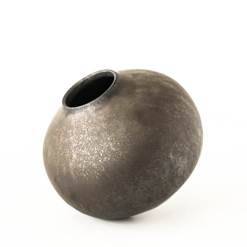 Household Simple Retro Tea Ceramic Airtight Jar with a textured, dark metallic finish on a white background.