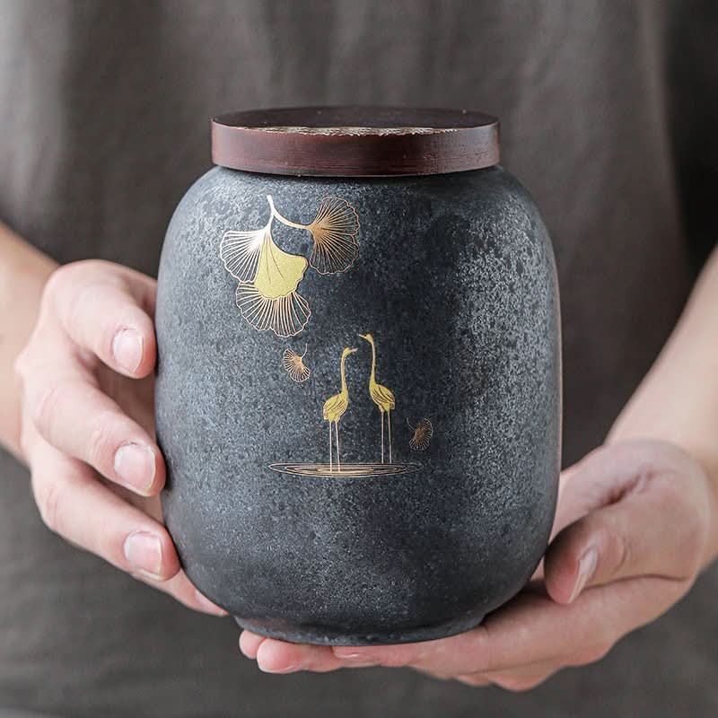 Dark grey stoneware tea caddy with gold cranes & ginkgo leaves, wood lid. Airtight storage jar.