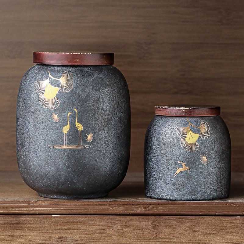 Dark stoneware tea caddy with gold cranes & ginkgo. Airtight kitchen storage jar.
