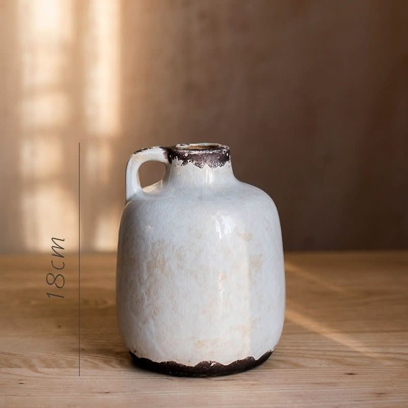 White ice cracked glazed mouth pottery vase with rustic charm. Perfect for farmhouse decor.