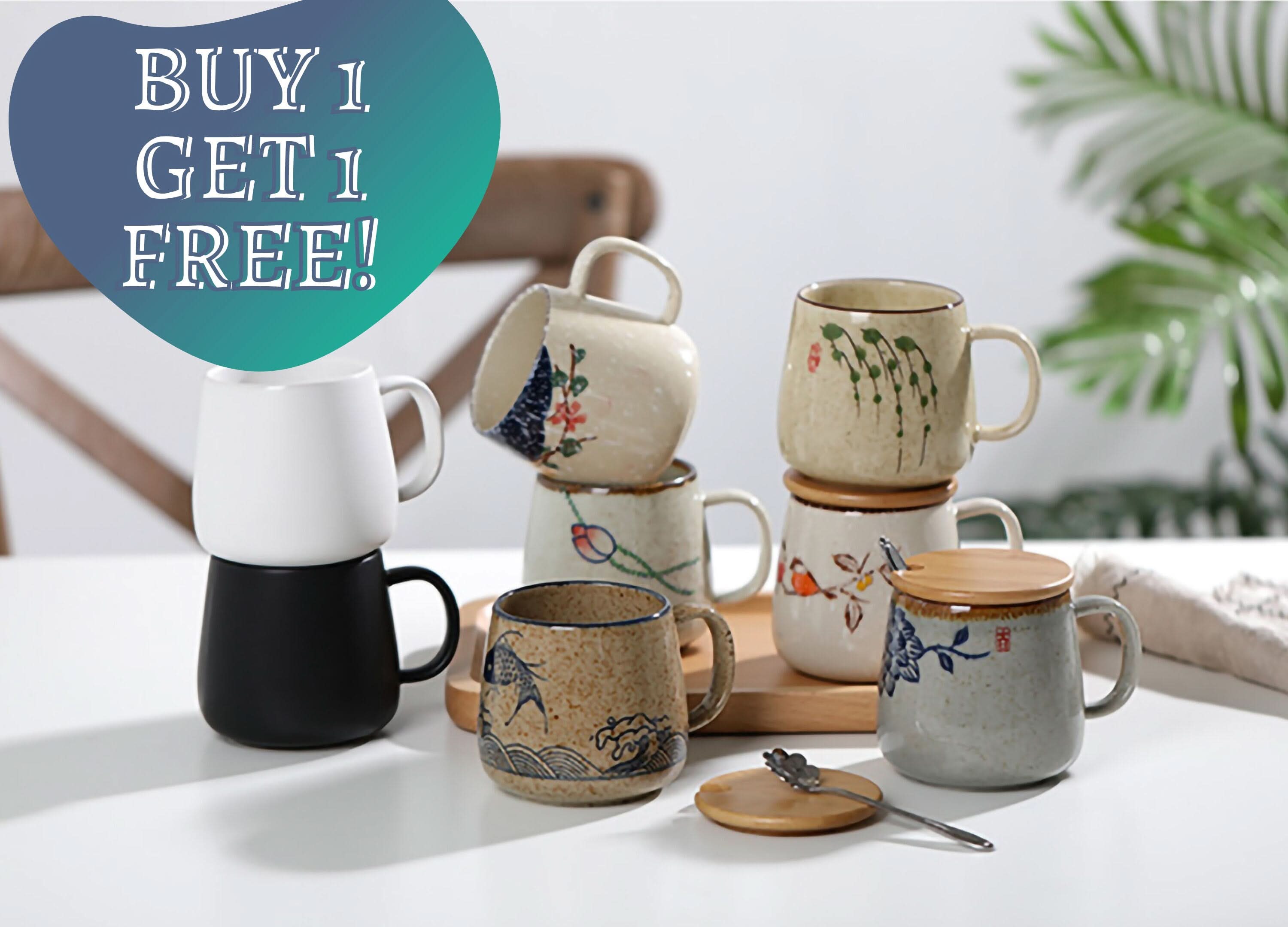 Set of 2 Japanese ceramic mugs, modern, minimal coffee mugs with floral and nature designs.