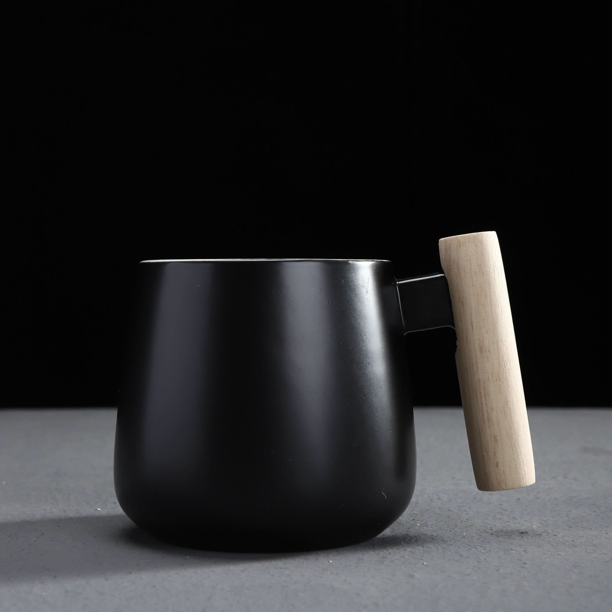 Black Japanese style large coffee mug with a wooden handle. 480ml latte mug.
