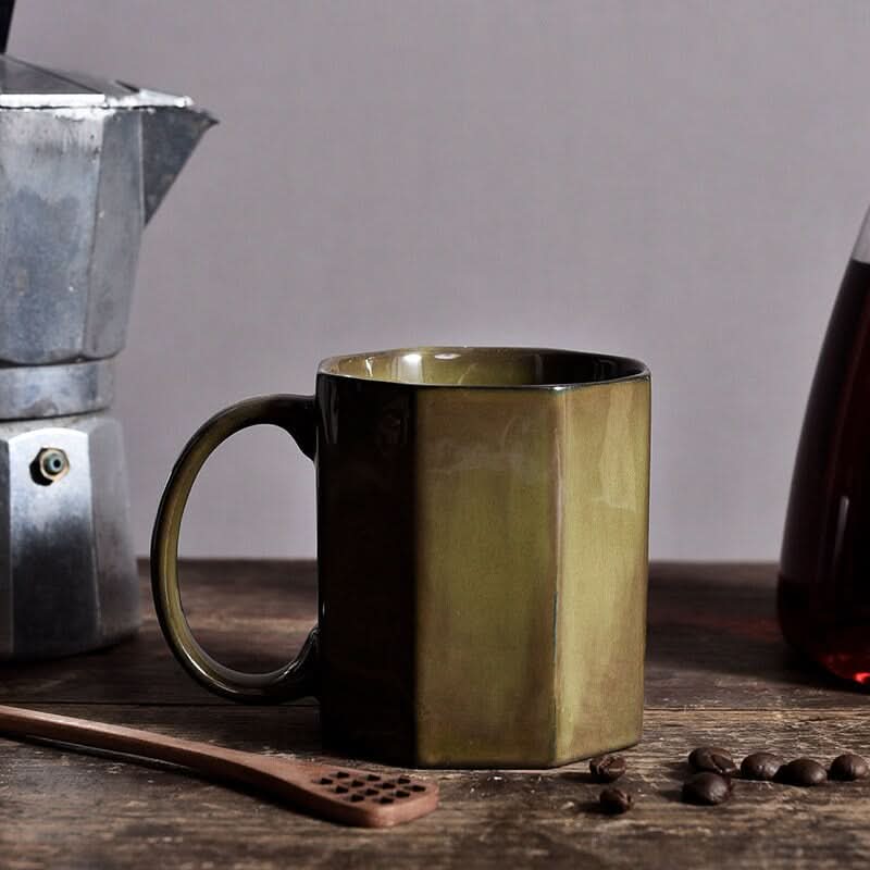 Nordic Rustic Hexagonal Ceramic Mug in olive green, with moka pot and coffee beans