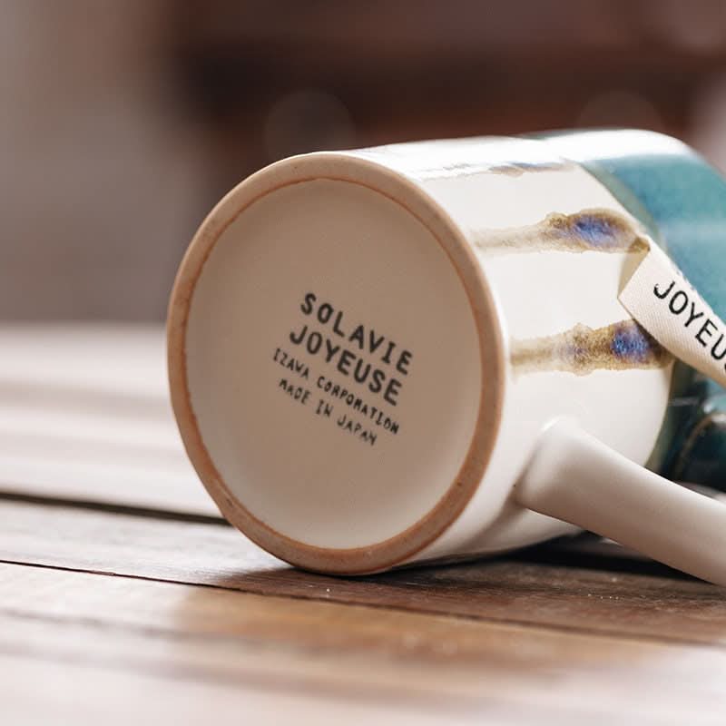 Japanese Stripe Glazed Ceramic Mugs 11.5oz, white and teal, with "Made in Japan" stamp.