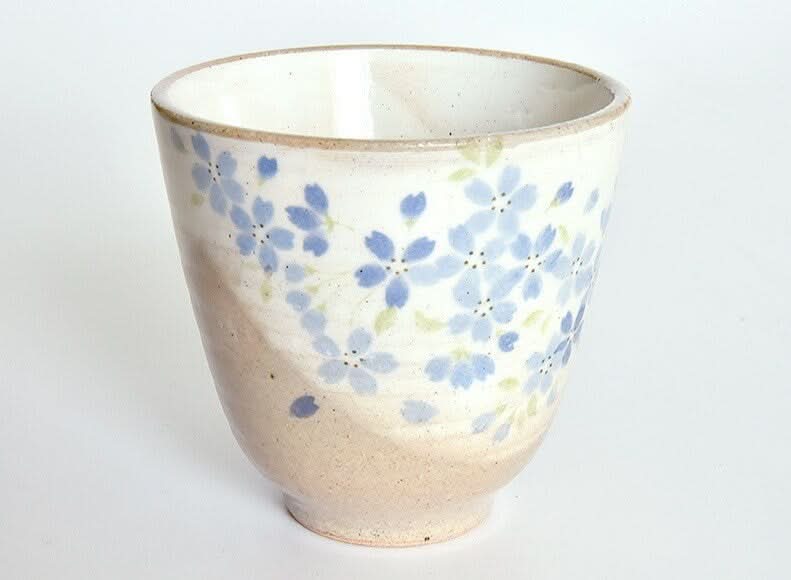 Japan Imported Stoneware Tea Cup, 7.8oz, handmade glazed mug with blue flowers.