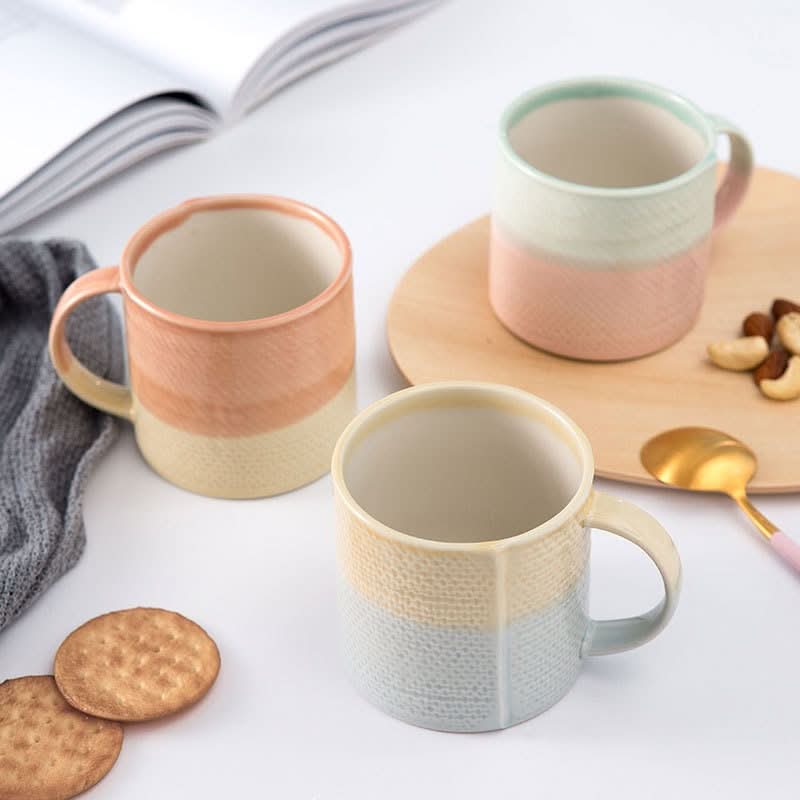 Japanese Pastel Colored Mugs: Retro handmade ceramic coffee cups in soft pastel hues.