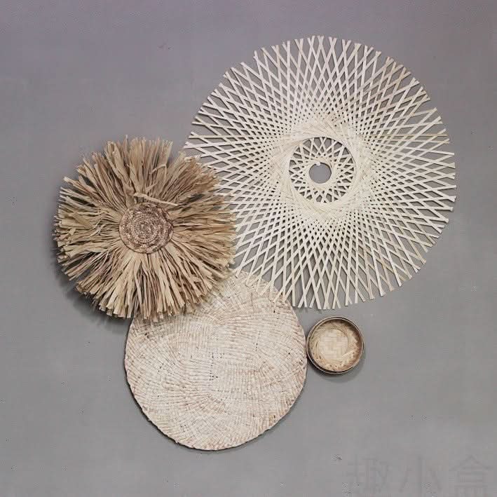 Boho rattan wall basket set: handmade straw circular decor pieces in natural tones.