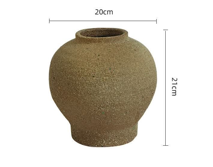 Rustic brown Wabi-Sabi vase with rounded shape and tight top, 21cm high.