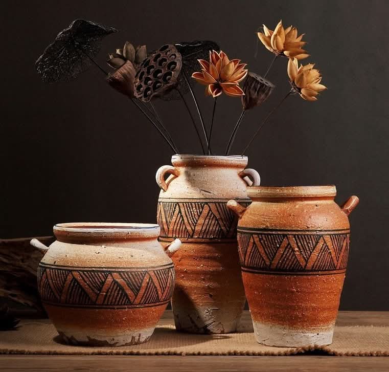 Antique ethnic vases with black tribal v patterns, terra cotta and cream finish, home decor.