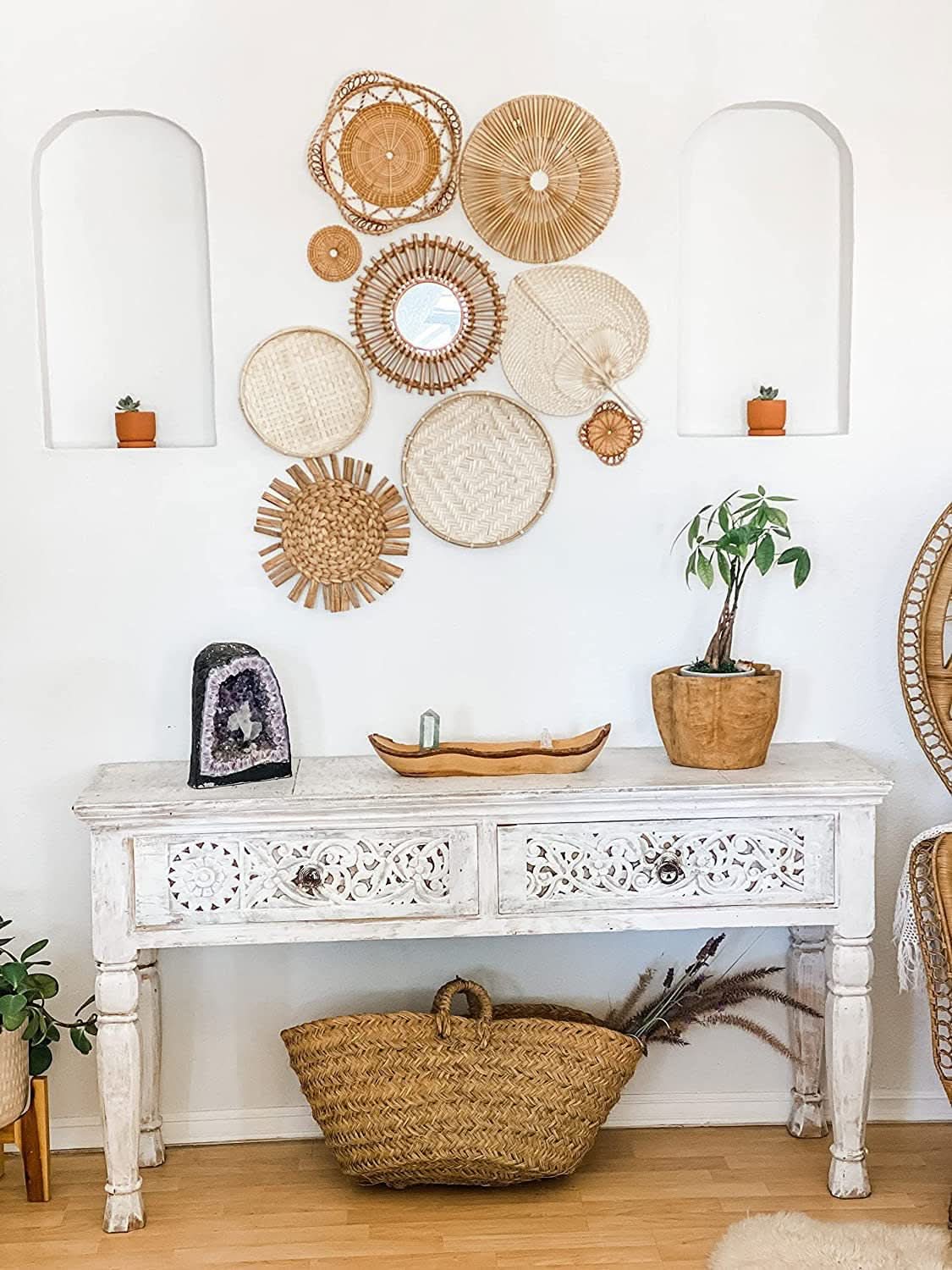 Handmade Straw Boho Wall Decoration with woven textures and natural tones on a white wall.