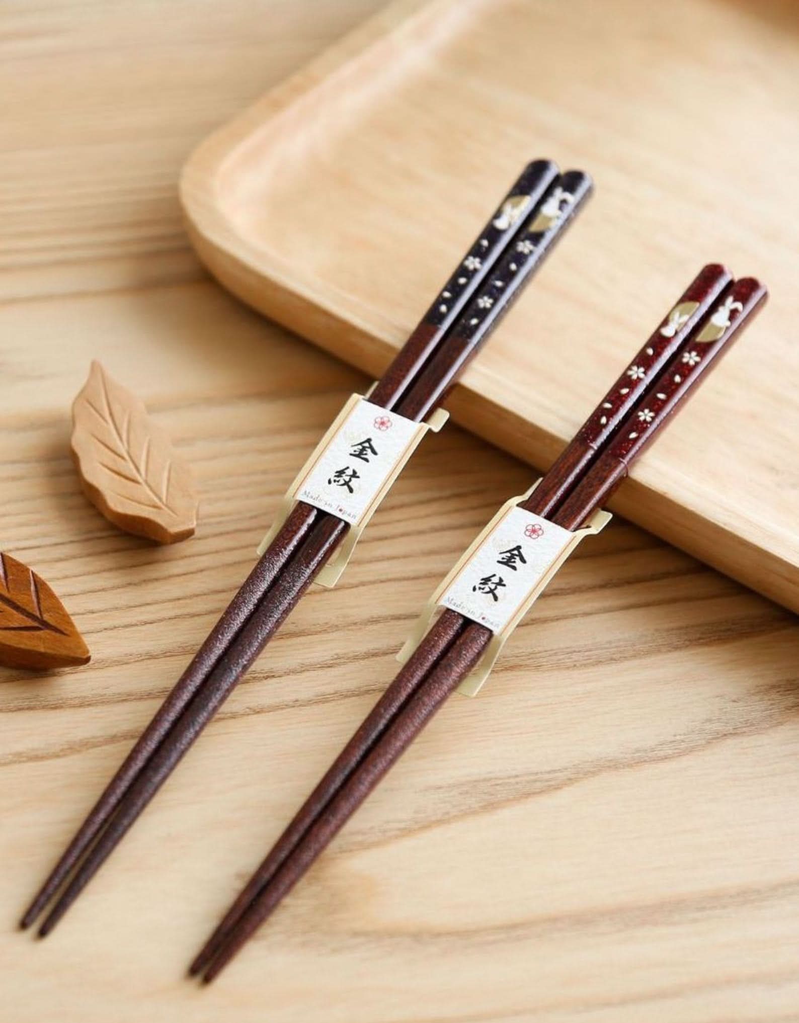 Japanese Cherry Rabbit solid wood chopsticks, dark brown with cherry blossom accents.