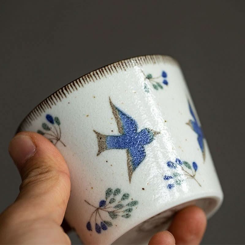 Japanese Mino-yaki Ceramic Hand-Held Cup, white with blue birds and floral motifs.