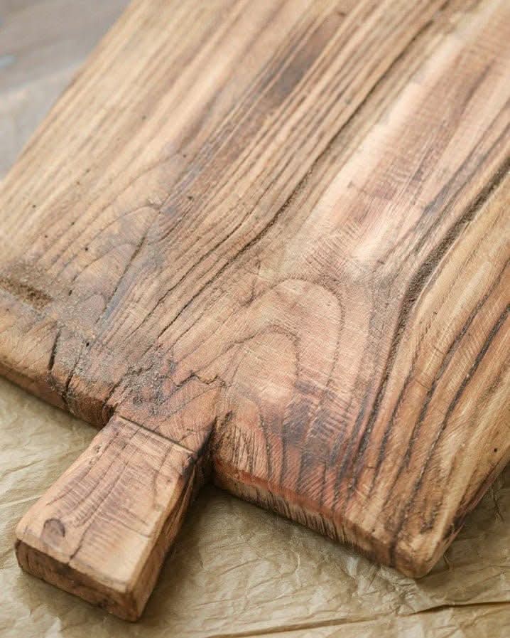 Rustic Irregular Rectangular Wooden Serving Tray with textured wood grain and handle.