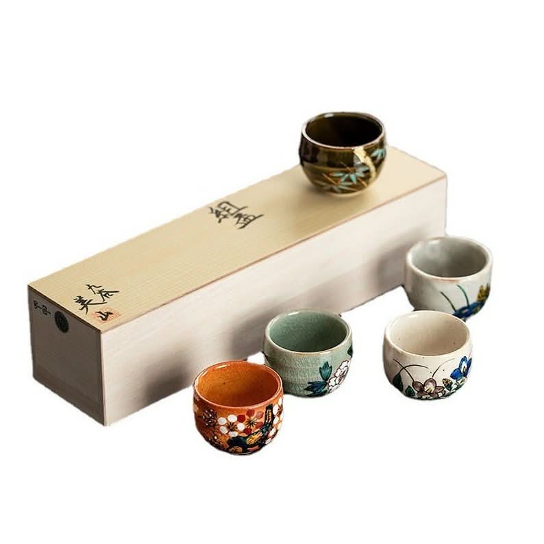 Ceramic Five-Herb Flower Tea Cup Set 2.03 oz/60ml with painted floral designs and wooden box.