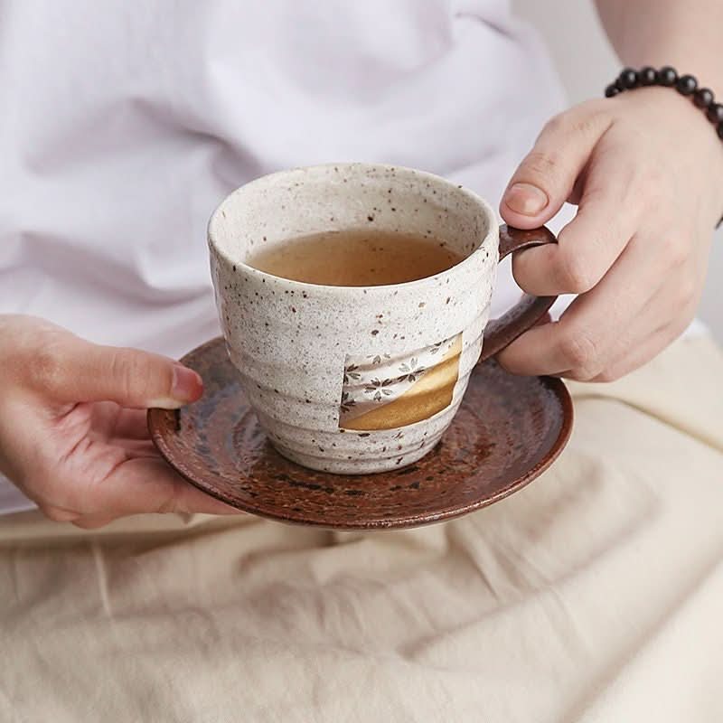 Japan imported foil mug, handmade ceramic couple cup with gold detail on saucer.