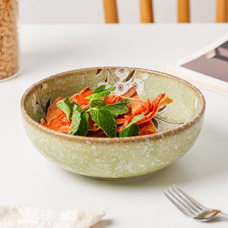 Green Cherry Ceramic Japanese Shallow Bowl with floral pattern, holding food and mint.