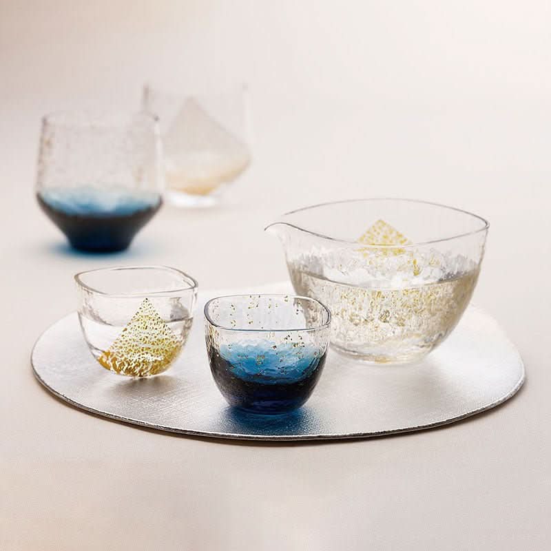 Japan Imported Hand-Made Colored Glass Cups with gold flecks and blue gradients.