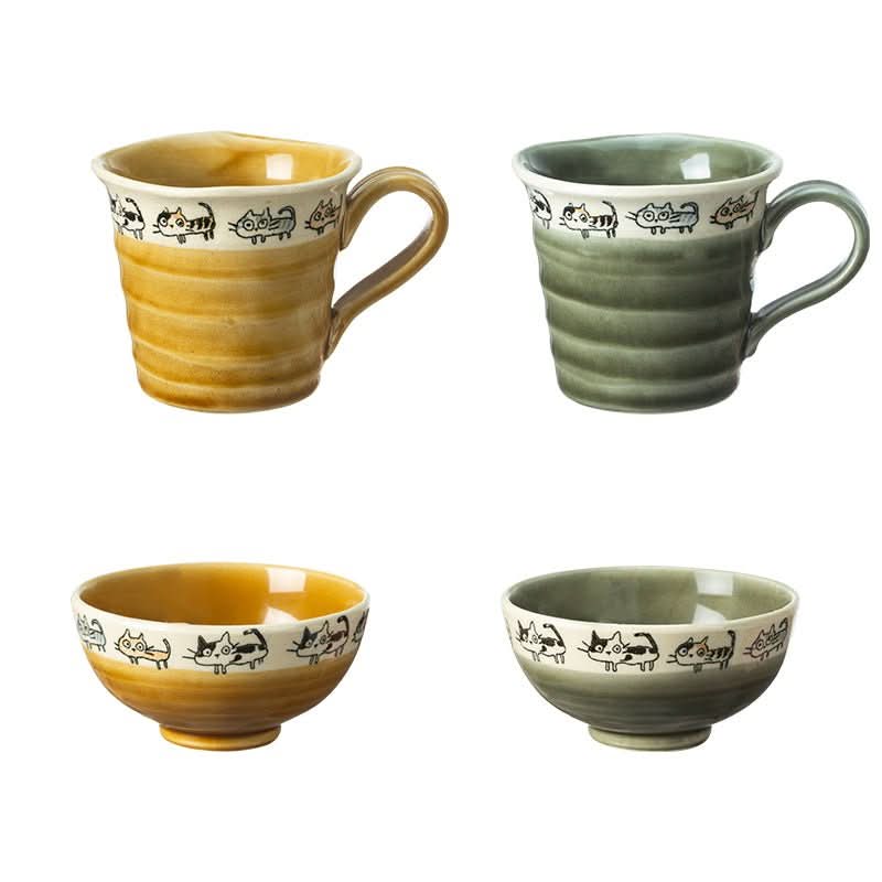 Japan imported Hand Made Screw Shaped Cat Mug set: yellow and green ceramic mugs & bowls with cat designs.