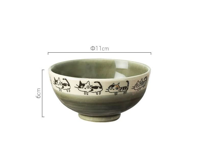 Japan imported handmade screw cat mug, 11cm diameter, 6cm height, white ceramic with green glaze and cat illustrations.