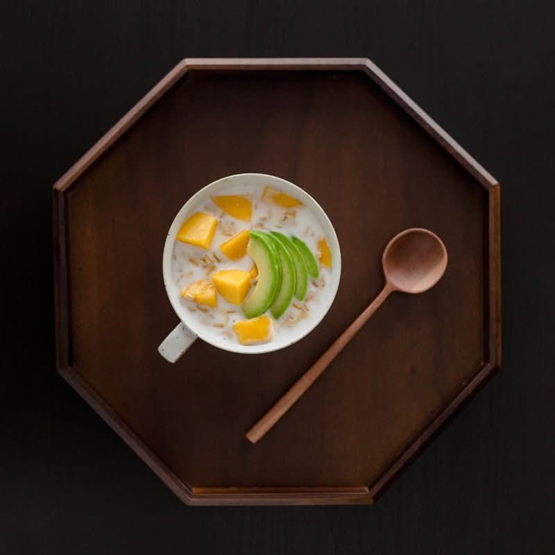 Japan Imported Hasamiyaki Ceramic Flower Sweet Breakfast Cup with mango, avocado, and oatmeal on a wooden tray.
