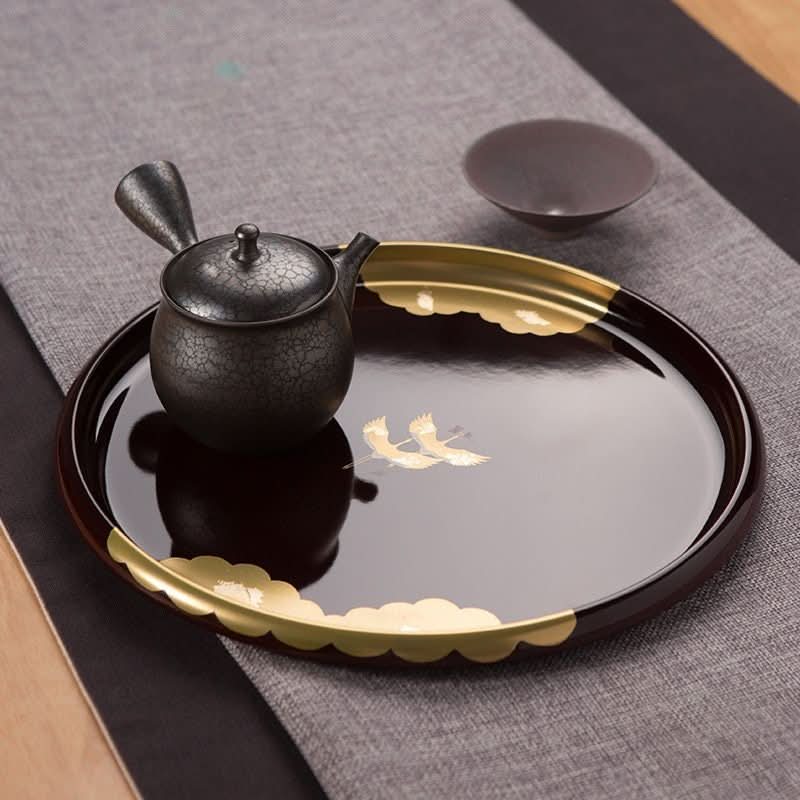Japan Imported Kishu Lacquerware Resin Tray: gold crane pattern on dark brown round tray, with tea set.