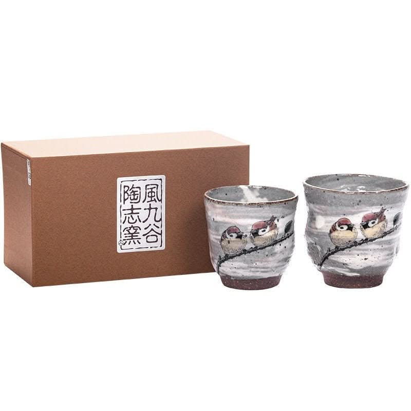 Japan Imported Kutani-Yaki Ceramic Cups with bird design, on a white background.