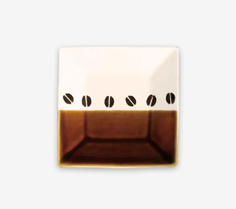 Japan imported Mino Yaki ceramic coffee cup, white with brown ombre and coffee bean design.