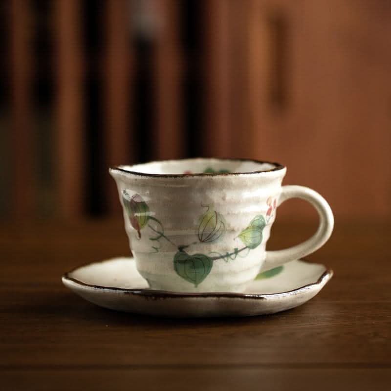 Japan Imported Mino-Yaki Ceramic Grape Vine Coffee Set Cup 7.1oz with saucer on wooden table.