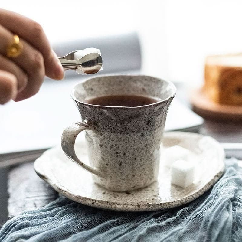 Japan Imported Mino Yaki Tea Powder Lead Set Cup, handmade ceramic mug with tea and sugar cubes.