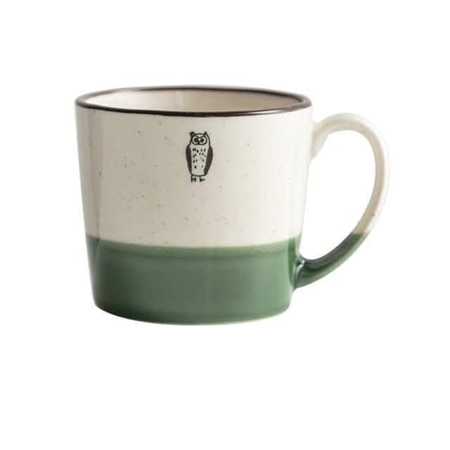 Japan imported Minoyaki Owl Mug: cream ceramic with green base, black owl illustration.