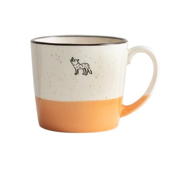 Japan Minoyaki ceramic dog mug, speckled cream and orange, with black trim and illustration.