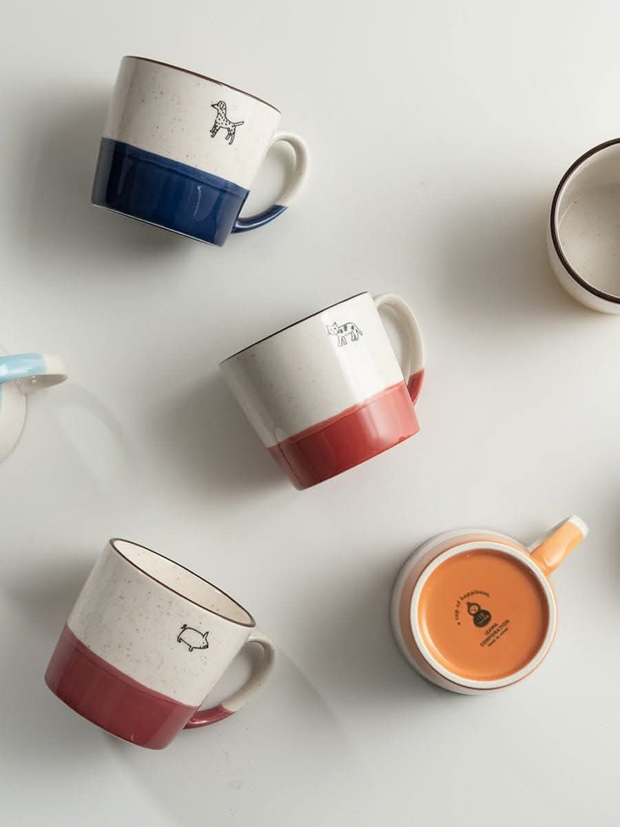 Japan imported Minoyaki animal mugs: owl, cat, dog, elephant designs on speckled ceramic.