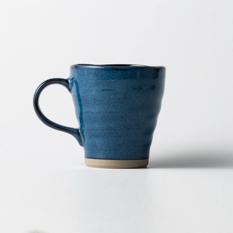Japan Imported Minoyaki Ceramic Mug, blue underglaze color, on white background.