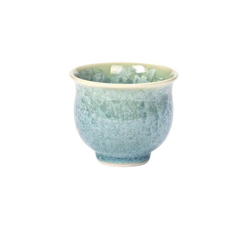 Handmade Shimizu-Fired Ceramic Tea Cup in blue with a textured, crystal-like glaze.