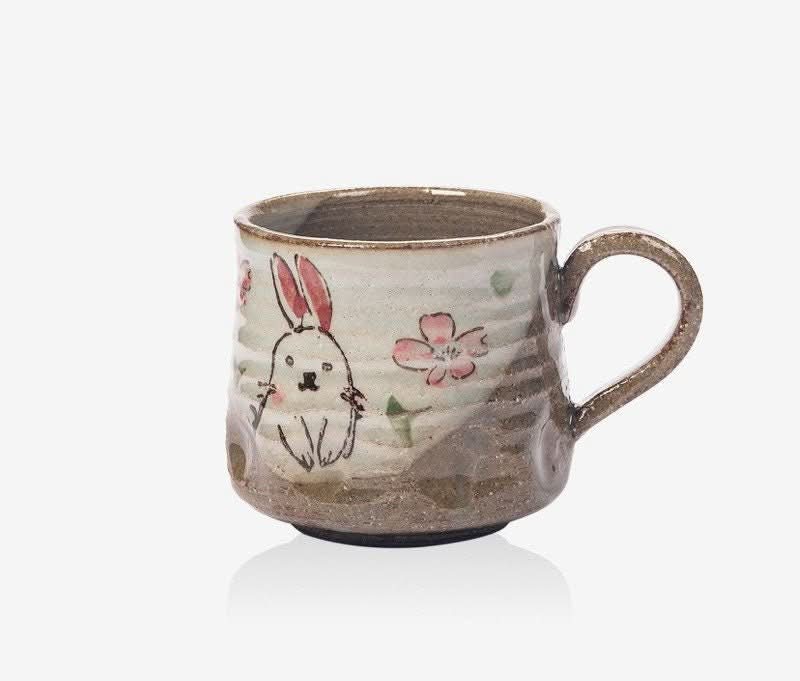 Japan Imported Seto-yaki ceramic mug with bunny & flower design. 8.11oz.