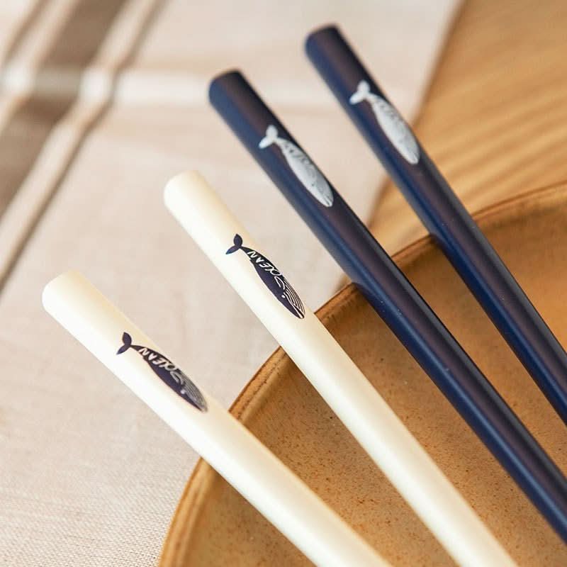 Japan Imported SUNLIFE Household Pointed Chopsticks: Cream & Navy with cute whale design on wooden tableware.
