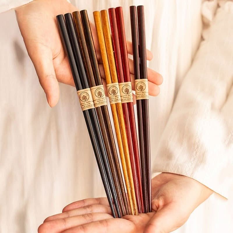 Japan Imported Sunlife solid wood chopsticks set in natural wood colors.