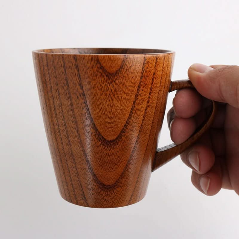 Japan Imported Traditional Lacquered Chestnut Wood Mug held by hand.