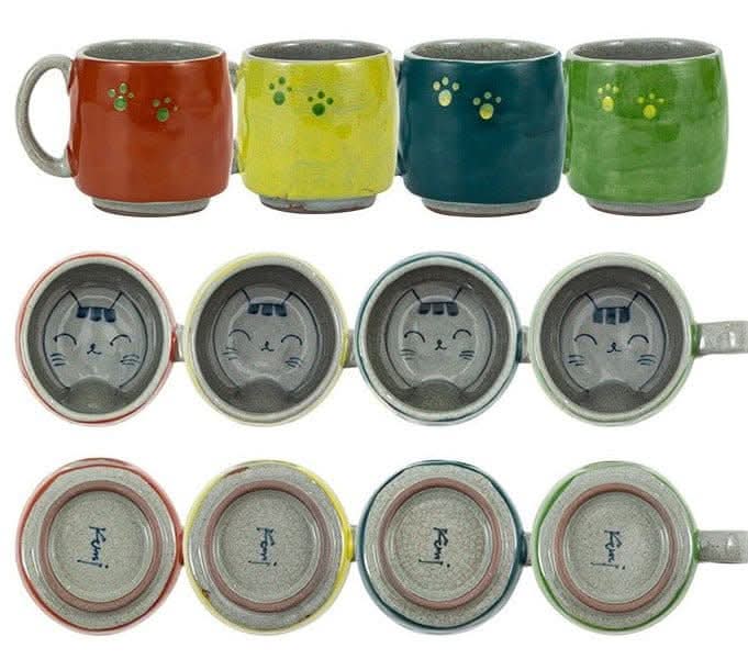 Japan imports Arita ware hand-made cat mug: red, yellow, teal, green mugs with paw prints & cat faces.