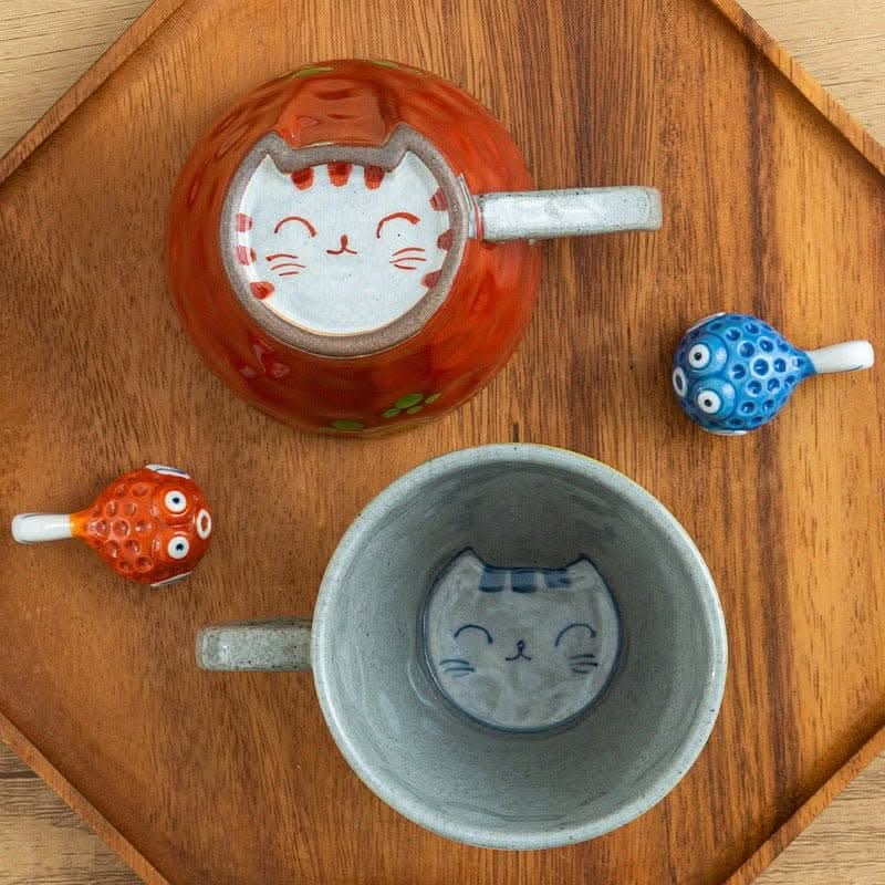 Japan imports Arita ware hand-made cat mug, grey & orange, on wooden tray with cute fish spoons.
