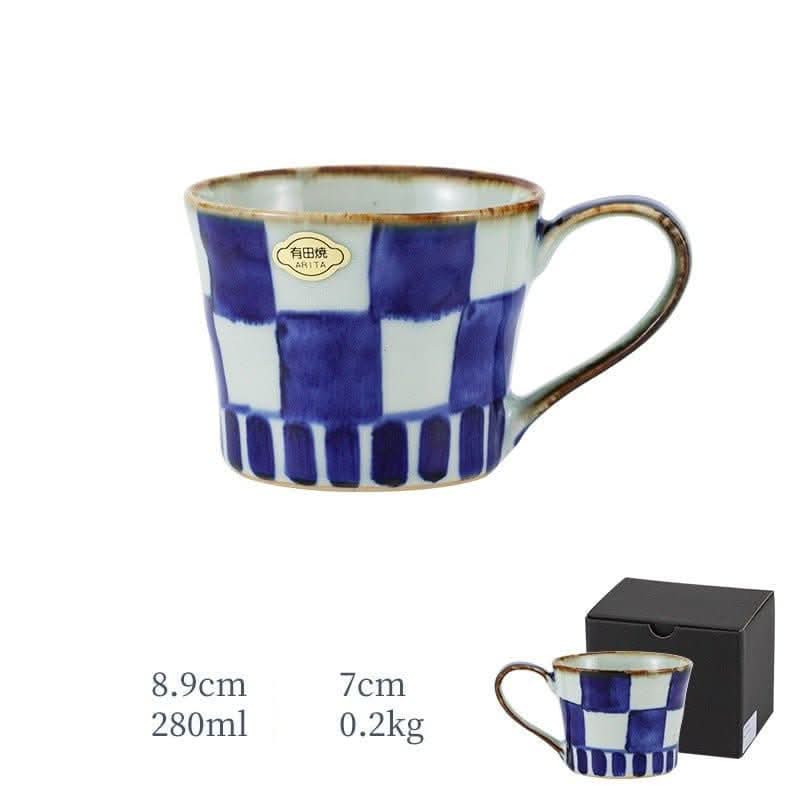 Japan imports Arita ware hand-painted blue and white checkerboard mug with rustic rim.