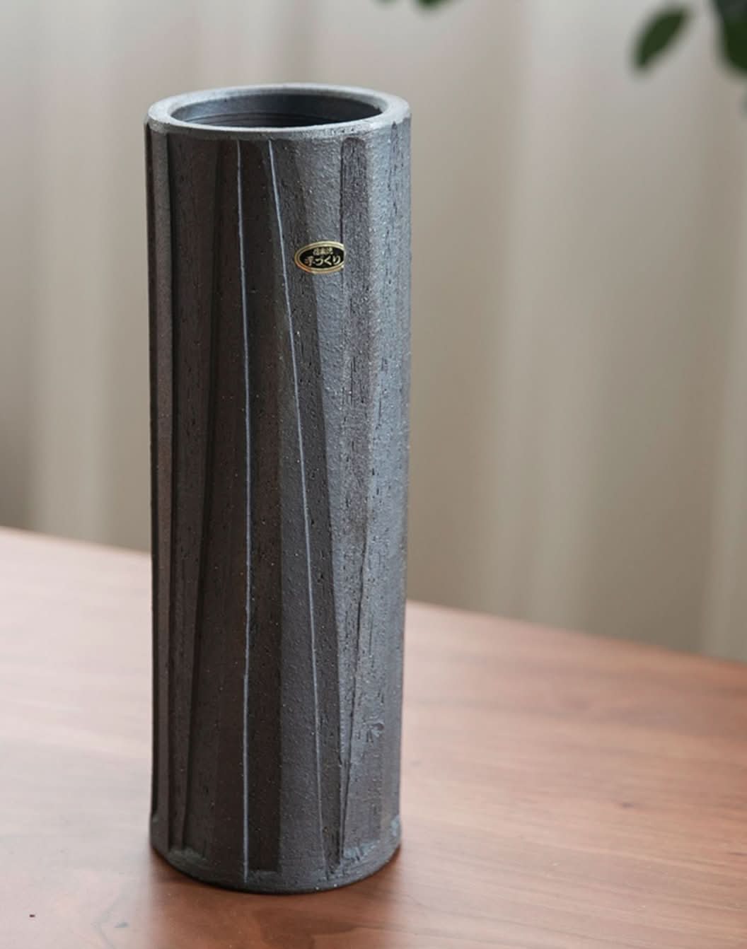 Lead-colored Shigaraki ceramic vase, rough pottery with vertical lines, Japan import.