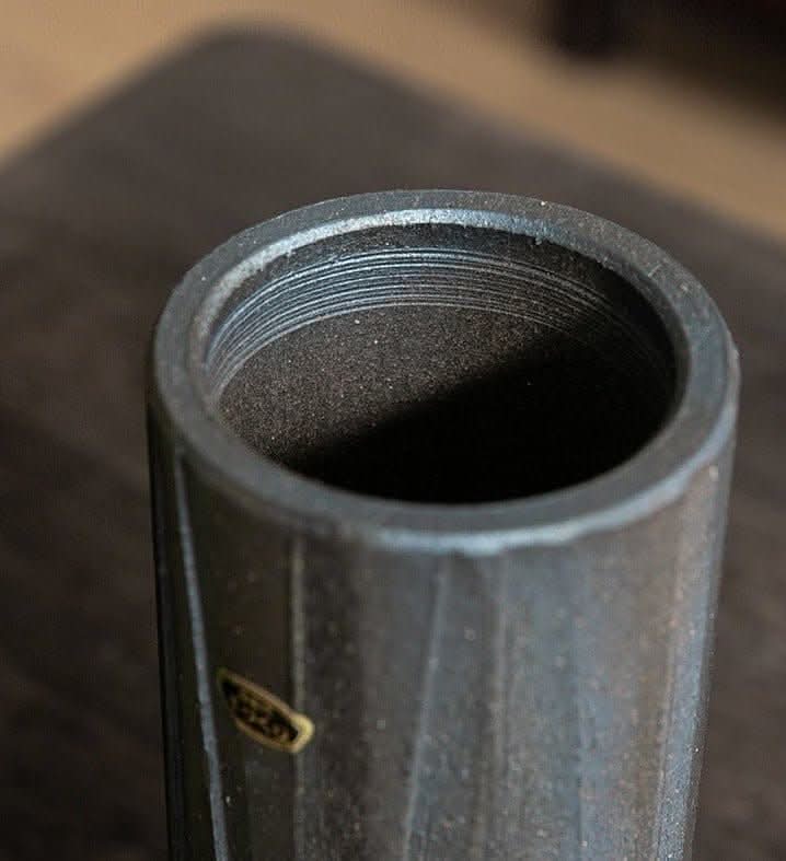 Lead-colored rough pottery vase, Japan imports Shigaraki ceramics straight into the bottle.