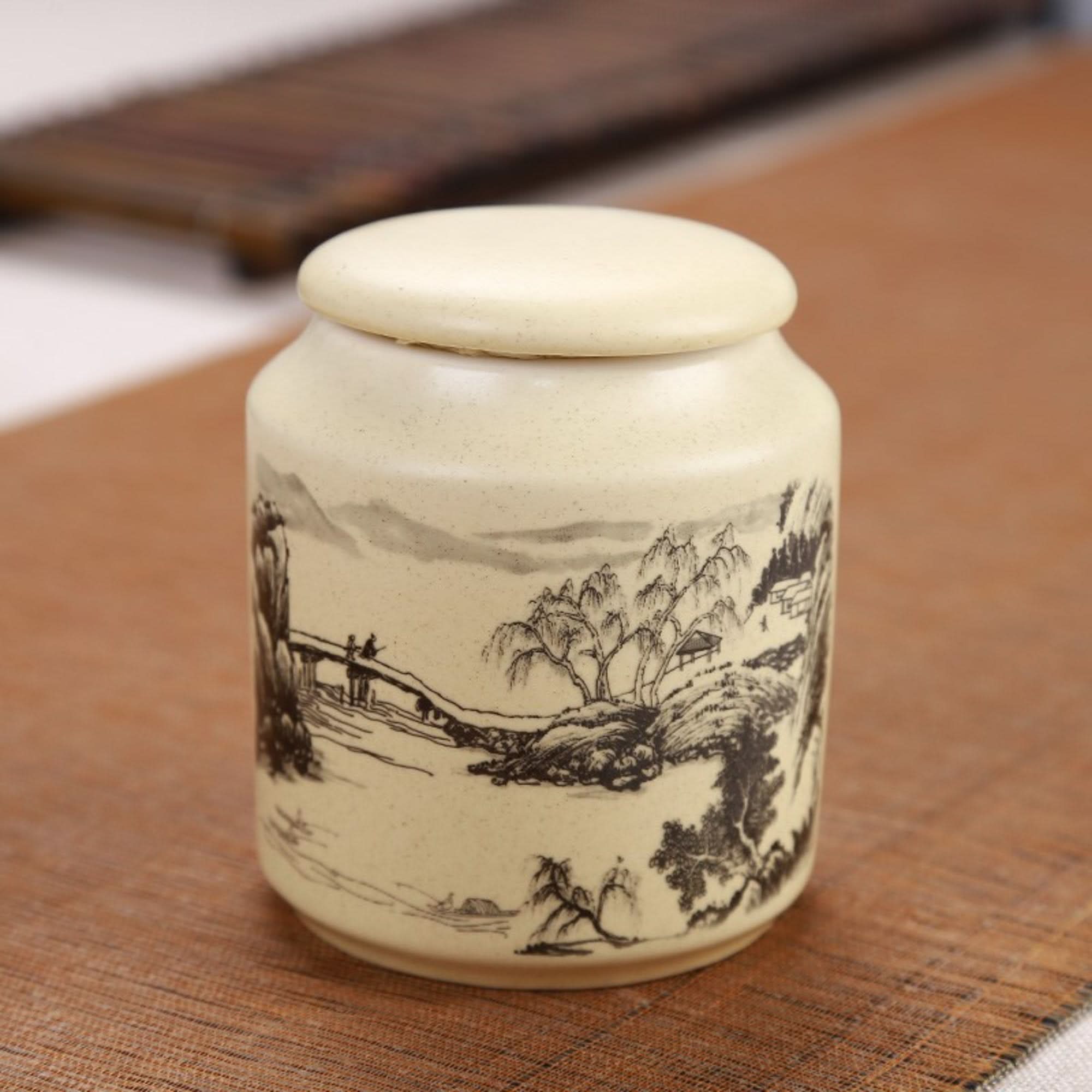 Japanese Art Ceramic Tea Container with scenic ink wash design, beige ceramic.
