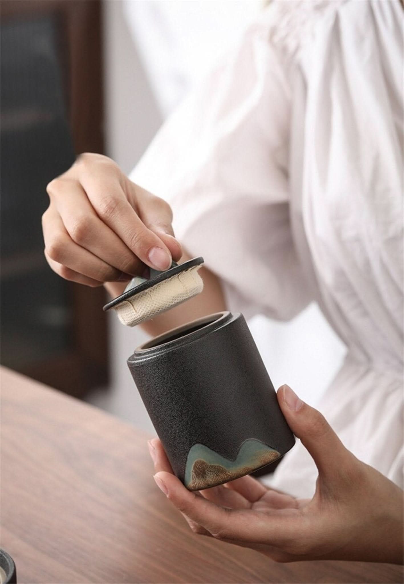Ceramic Tea Canister Matt Finish with textured surface and decorative base.